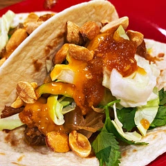 I marinated the beef for an hour before cooking and then thickened the sauce after shredding the beef to capture more of the flavor. I also added some raw green cabbage to top the tacos and the extra crunch was an enhancement.