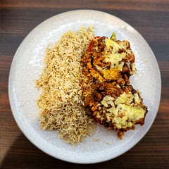 Very tasty, served with brown rice. Added fresh tomatoes rather than tinned, harissa paste (amp the spice up a little), mixed herbs, balsamic vinegar, more onion and more garlic. Couscous maybe next time.
