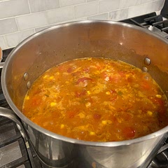 Add a little sour cream and cheese to your bowl.  Very good.
