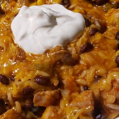 I think the rice needs to be pressed under the liquid to be cooked better but overall a tasty dish! We eat ours with tostitos chips!