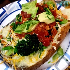 We started the potatoes in the microwave to speed up the cooking time but finished in the convection oven because we wanted the skin crispy. We had a baked potato bar with salsa, sour cream, broccoli,  chopped up bacon, shredded cheese, and avocado.