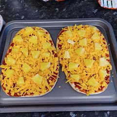 Very tasty! Actually prefer naan base to pizza base now. Picture was before I cooked it. Son loved it!