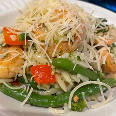 Added cauliflower rice, red pepper and green beans