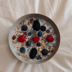 Added milk to eat and served topped with berries.