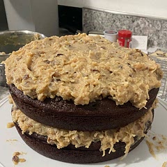 This cake is excellent! The chocolate cake itself is moist and airy. The coconut-pecan frosting was delicious matched with the cake. I chopped my pecans up a bit more and I would have liked to have more frosting to put on the sides.