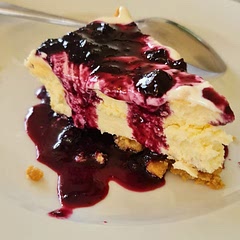 First time making cheesecake, perfect!  Blueberry sauce.  I froze the other half.  Can't wait to have it again!