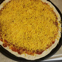 Wonderfully easy pizza dough! Def dont need a mixer for this when you have hands! First time making my own pizza along with fresh sauce super good!