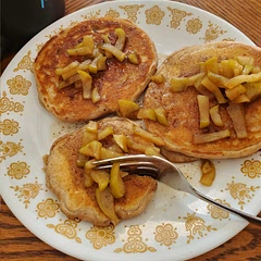 I used a scoop and a half of protein powder and added an extra egg. I also topped them with apples cooked in cinnamon, brown sugar, and water.
