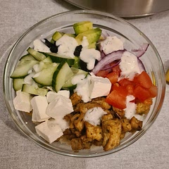 I added red onion (as it was shown in the recipe pic but not in the recipe) and swapped chicken for tofu as we had vegetarian guests. Also made with couscous instead of quinoa because it's what I had on hand. Pretty good!