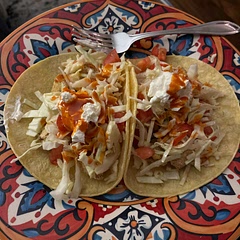 Needs lots of extra salt in the batter. Slaw with half a head of cabbage, 2 Roma tomatoes, 2 limes, salt and pepper. Would add cilantro and green onions maybe if I had any. Cholula and sour cream good for toppings.