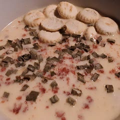 I had a half gallon of whole milk to use up so I tried doubling the recipe. Instead of the rice that they recommend, I used a cup and 2/3 of brown rice to one cup of wild rice and made it in my rice cooker. I used a pound of Velveeta cubed and two cups of sharp cheddar cheese shredded. I was going for comfort food so rather than put in cream of potato soup which I did not have oh, I use two cans of cream of mushroom soup and one can of cream of celery soup. The next time I make this I will use half the amount of milk but the same quantity of cheese and rice. And the bacon and chives on top are very good.