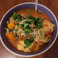 Yum! My husband and I loved it. I doubled the garlic and chilli flakes, and instead of cooking the tortellini separately I just threw it into the soup since it was the kind made with fresh pasta. If you are using dry or frozen I recommend cooking it separately. Also I topped it with sun dried tomato pesto instead of kale because it's our favorite and I couldn't find kale pesto.