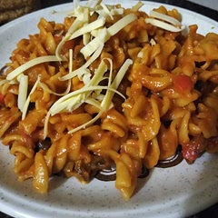 I've had this before with dried soy but I didn't like it. I used Sainsbury's fake chicken pieces. It's a really tasty meal that goes far. Sprinkle crispy onions and cheese on top for a proper treat.