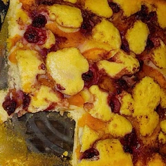 I doubled the recipe to make it fit a 9x13. I only used 1.5 cups of sugar and used all purpose flour. I wish it would have rose more while baking. I also added some frozen/thawed raspberries! Whenever I e made peach cobbler, in the past, I would put the fruit on the bottom and pour the mix on top so I was excited to see how this turned out. It was delicious! Oh! Almost forgot! I added some cinnamon to the melted butter, too! I will definitely make this again and maybe use self rising flour and baking powder. I'm not expert but maybe that will make it rise more?