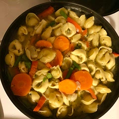 This is a go-to recipe when the hubs and I go cook for family. Rich in flavor, hearty but not heavy.  I suggest using chicken stock for a more robust broth, and use whatever veggies you have on hand.