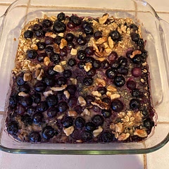 Used a frozen banana and frozen blueberries. Did not precook the bottom layer. Substituted old fashion oats and unsweetened coconut milk for the oats and milk listed. I combined them with the egg etc and pored it over the bottom layer then topped with berries and nuts to the top and baked for 40 minutes.