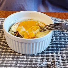 Our ramekins are a little bigger so they look a bit low. We used 4 eggs and will add more vegetables next time.