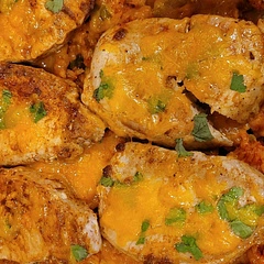 I added taco seasoning to the pork, and covered everything in cheese. It turned out great and was a huge hit.