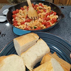 This recipe is easy and delicious! It's very Spanish tapas/Mediterranean. Light yet filling. Nice balance of flavors. We added crusted bread to the meal and it was perfect. Next time we will almost fully cook the beans and tomatoes before adding in the shrimp, otherwise the shrimp gets cooked a bit too long and is chewy. Not terribly kid friendly but she survived!
