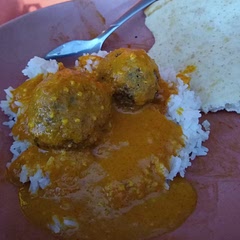 So I tried to make the recipe the way it's written but I had to make a few changes to the sauce. The lentil meatballs are good but a little bland. Next time I plan to add breadcrumbs, garam masala, extra salt and maybe extra cilantro. The sauce definitely needed some help. I added about 1 tbsp of red curry paste. Definitely helped to improve the flavor. I may try experimenting with other curry powders in the future. Overall not a bad recipe just needs a little help but I'm willing to make it again.