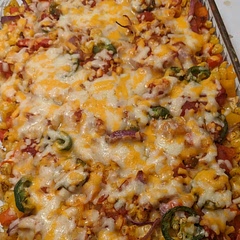 Diced and roasted the veggies before layering. Added beyond meat grounds, browned in a pan.
Used salsa diluted with water instead of enchilada sauce.