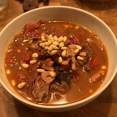 This does well without pine nuts, and a bit of lemon juice instead of orange zest.