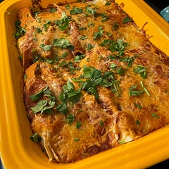 I had enough filling to make 10 enchiladas so I went with it. Everyone loved this one. The scratch enchilada sauce was easy to make but canned would also do just fine if you wanted to save some time.