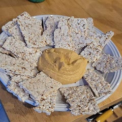 I didn't have an tahini so I put 1/2 tsp of sunflower seeds in. I also used 2 tbs of Minced garlic. The rest is just as read! Pretty tasty really. Great snack! I paired it with some rice and quinoa crackers and it was really good! Would be really good with some veggies but didn't have any on hand.