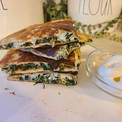 Delicious. I added more cheese... Couldn't help it! Its not a quesadilla you'll get at a Mexican restaurant, but it's still pretty tasty!