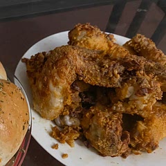 I did it with big drumsticks and wings. One thing is you have to make sure you coat the whole chicken with oil spray.