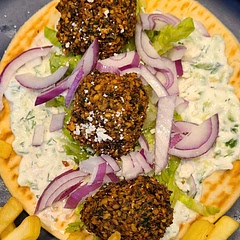 Delicious! Paired with falafel on pita.
