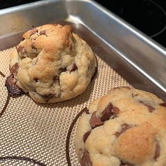 Subbed mini eggs for mini Reese’s peanut butter cups. Mine did not flatten much after baking like the pictures but were absolutely delicious. The dough was crumbly which I was worried about but did not see any issues. Great chew. Definitely making again! My new go to cookie recipe.