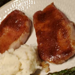 I use it on pork chops all the time by cooking them in the oven on a pan and wire rack. If you like asparagus, try placing them below the wire rack and it seasons them with what runs off.