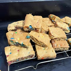 Added M&ms - absolutely delish and much less hassle than making three trays of cookies. Will definitely be using this recipe again.