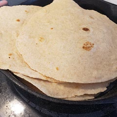 I used half all purpose flour and half whole wheat flour because I wanted them to be healthier. I liked how they turned out. I cooked in a dry, smooth cast iron skillet.