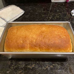 Prepared the dough in early AM and refrigerated after step 6. Dough rose about a half inch 1/2” above rim of pan while in fridge for 6 hours. Left it out for w hours per instruction and then baked off. Loaf fell a bit. 

Delicious flavor. Good texture. Will try again without interruption.