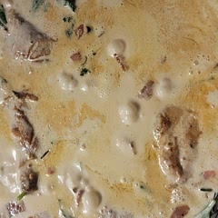 Creamy. Flavorful. Yum. I tweaked a few things here and there. Added diced tomatoes.