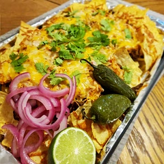 The cream cheese with the beans was 🤌 don't skip it! This reminds me of my childhood, when my mother used to make sheet pan nachos. My sister and I would pile into our parents bed with them, and eat while watching survivor. Definitely some nostalgia here. A++