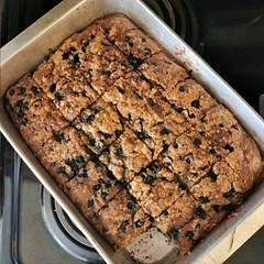 So, I did have to make several substitutions. For the butter, yogurt, and milk I subbed margarine sticks, coconut yogurt, and oat milk; for the caster sugar I did half white sugar and half brown sugar; and I was out of eggs so I had to use bananas. I'm not excited about the bananas cause I'm not a huge fan of them. For my fellow Fahrenheit-ers out there: 200 C is roughly 390 F and 180 C is roughly 355 F (rounding since my oven does increments of 5). I did end up making this bar style since I'm too lazy to use muffin tins.
As I thought, they tasted like banana muffins. Next time I really need to use actual eggs. These really aren't bad, but they are a little bland. Even with the bananas.