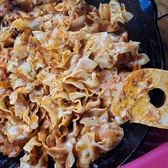 Totally tweaked it... someone said edges of lasagna, so I used egg noodles that were  soaked in boiled water added that to the sauce...bunch of extra dried spices as well.
Probably add the ground, sessoned meat next time.
