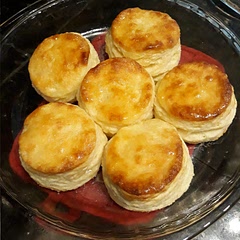 I baked two separate batches, one in the glass pie dish and the second on a sheet pan. The biscuits in the pie dish came out waaaaay better so your choice of baking dish really does matter!