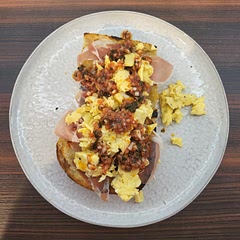 A good brunch idea. Tasted good! Scrambled the eggs instead (partner doesn't like poached, but It would have been better I think) and used a dash of tomato puree as we didn't have fresh. A new weekend special!