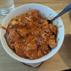 Added two chillies to get the spice level we liked. Made using one block of tofu (about 400g) and the 3 servings measurements. Made enough for 2 people. Think adding spices to the tofu as it bakes would also add another dimension