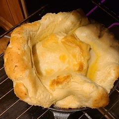 Butter will build up in pockets on top of the pancake, use a basting brush to spread it around the rest of the cake