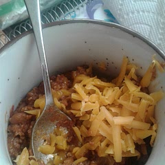 I didn't have chili seasoning, so I sort of made my own flavor combo: mexican seasoning, chili powder, onion/herb, and garlic/herb. Also grated cheddar cheese on top. Yum!