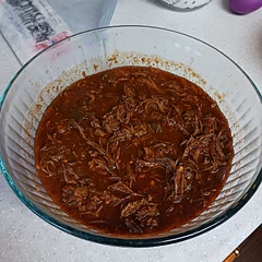 I kept the sauce amount the same, but used half of the beef required. Probably should have used a little less since I had too much at the end. Not pretty, but pretty delicious!