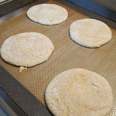 I used soy milk instead of almond milk, and it worked fine. The dough is actually like a batter, so you can't roll the unbaked cookies in sugar first, but sprinkling it on with a spoon before baking is effective.