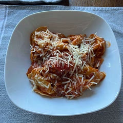 we used ravioli instead of the pasta, omitted the red pepper flakes, and used nondairy cheese and milk