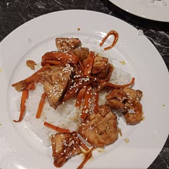 Added some pineapple pieces and Julienne carrots. Didn't have any whole pineapples handy so just served on rice.