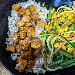 We swapped the edamame out for stir fried courgette, carrot, green beans and sweetcorn. The tofu is sweet and spicy, good combination. Easy to make and we'll have again.
